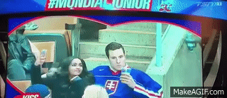 Slovak_Fan_Kisses_His_Beer_Instead_of_Girlfriend_on_World_Juniors_Kiss_Cam_HD_Full.gif
