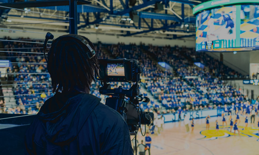 South Dakota State University Basketball Event Production Student Filming Game
