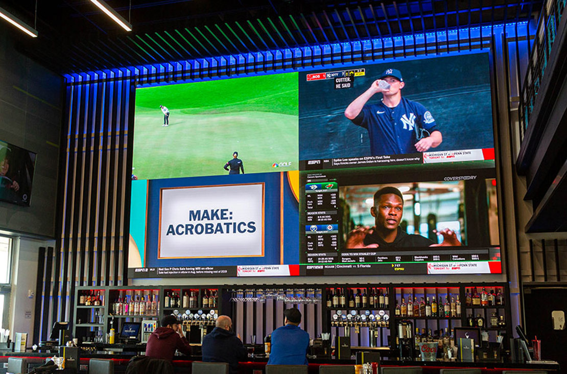 LED video wall behind bar