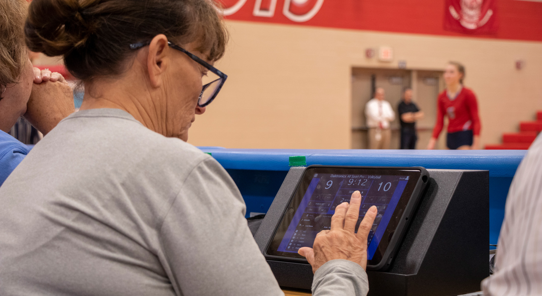 one woman using all sport pro on ipad