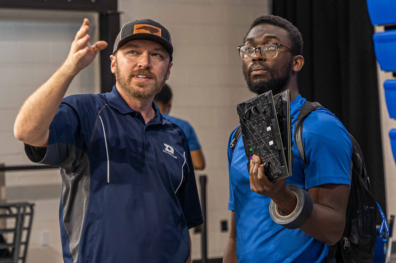 two people discussing site details