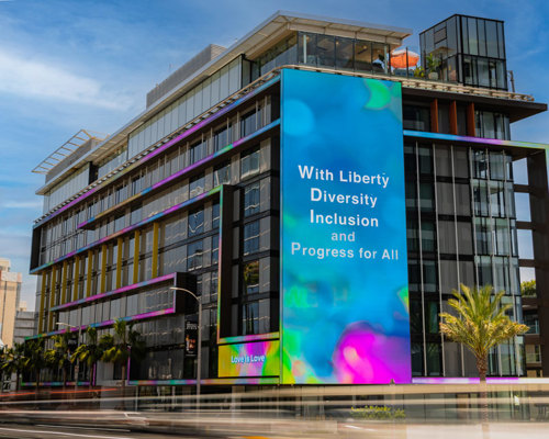 Building with strips of LEDs wrapped around building