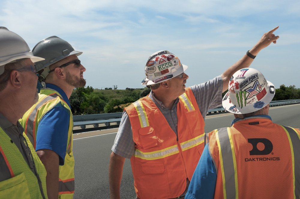 daktronics installation workers observing site