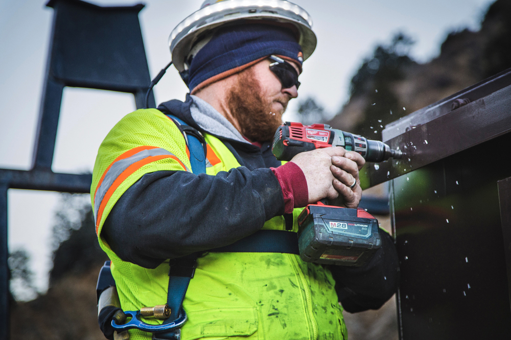 field service worker with drill