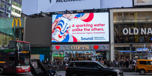 Heritage Outdoor billboard above store entrance in Times Square