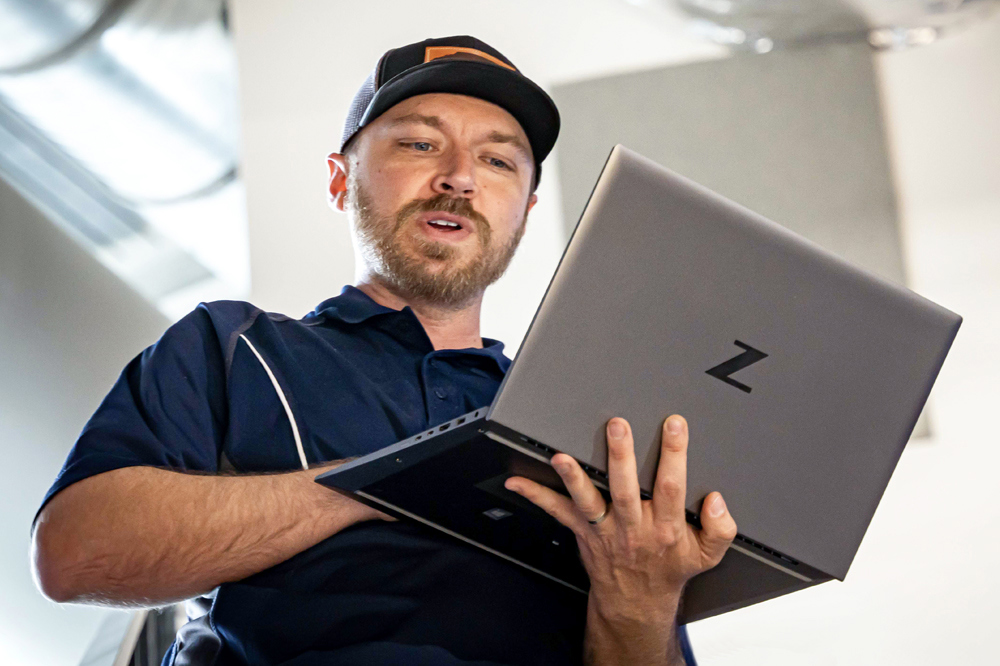 field service worker using laptop