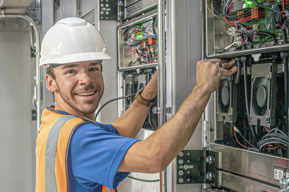 installation tech working with LED display wiring