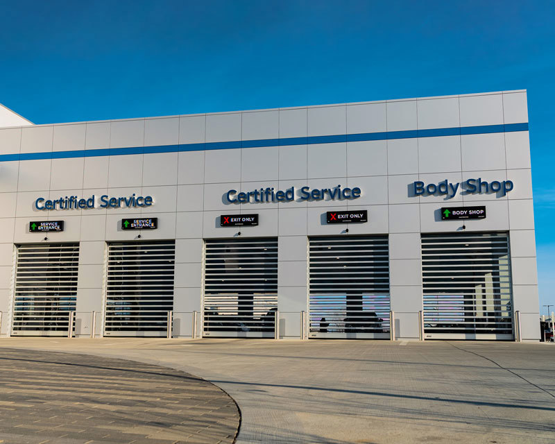 Truck repair shop with LED stall labels