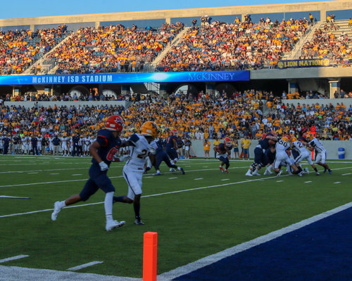 LED strip along seating in football stadium