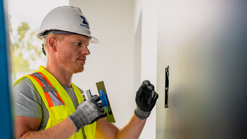 field service worker replacing LED modules