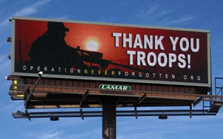 Digital billboards display public service announcements.