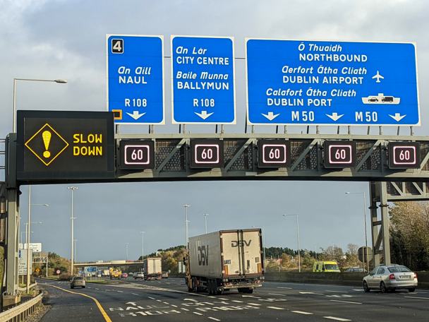 Digital displays over each lane of busy road